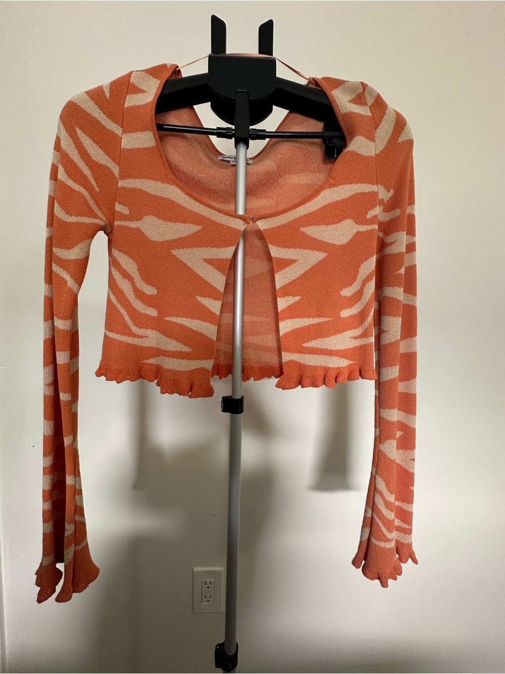 Cropped Orange Zebra-Pattern Ruffle-Hem Cardigan